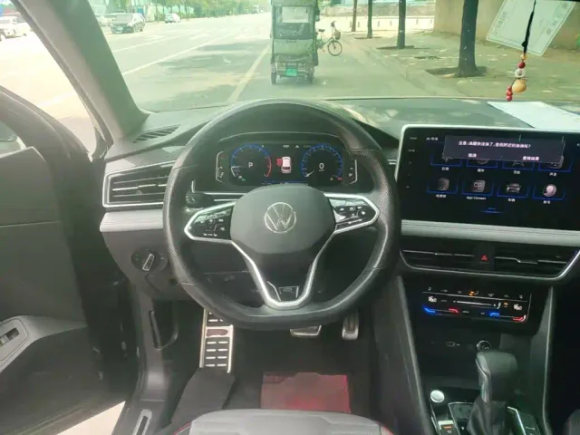 Volkswagen Tiguan L — Фото автомобиля 10