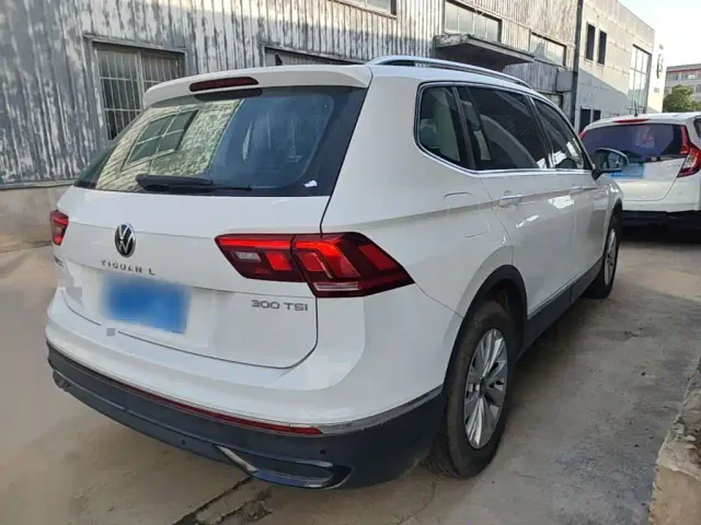 Volkswagen Tiguan L — Фото автомобиля 6
