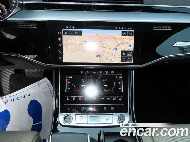 Audi A8 55 TFSI quattro Premium LWB — Фото автомобиля 14