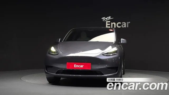 Tesla Model Y — Фото автомобиля 3