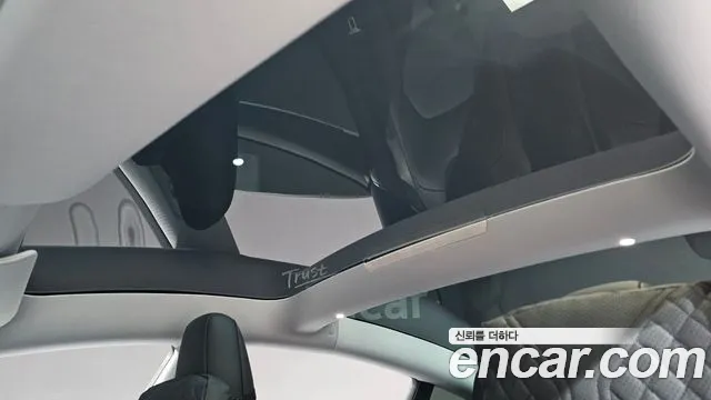 Tesla Model 3 — Фото автомобиля 30