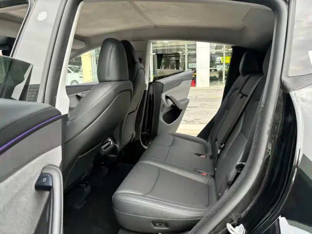 Tesla Model Y — Фото автомобиля 8