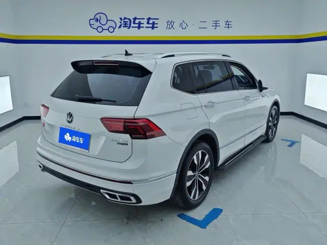 Volkswagen Tiguan L — Фото автомобиля 3