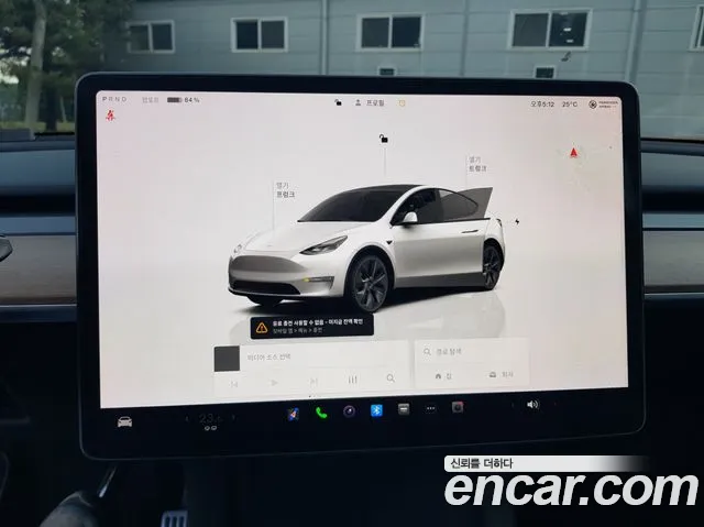 Tesla Model Y — Фото автомобиля 8