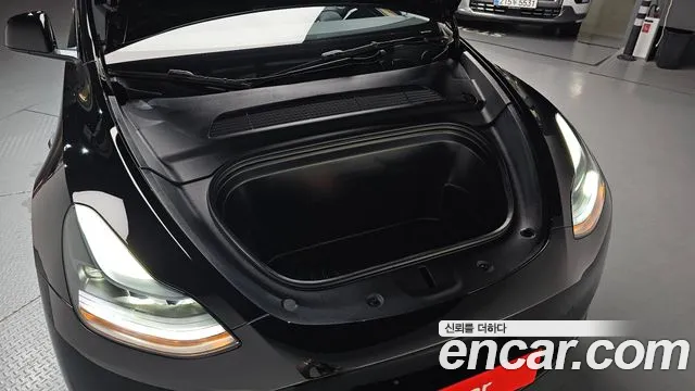 Tesla Model Y — Фото автомобиля 5