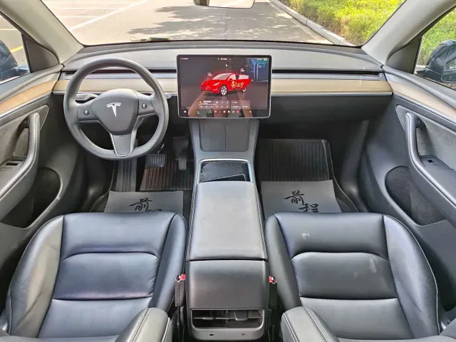 Tesla Model Y — Фото автомобиля 13