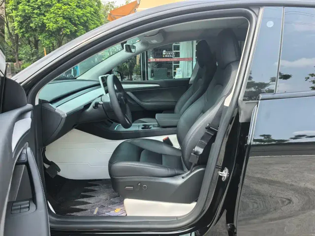 Tesla Model Y — Фото автомобиля 7