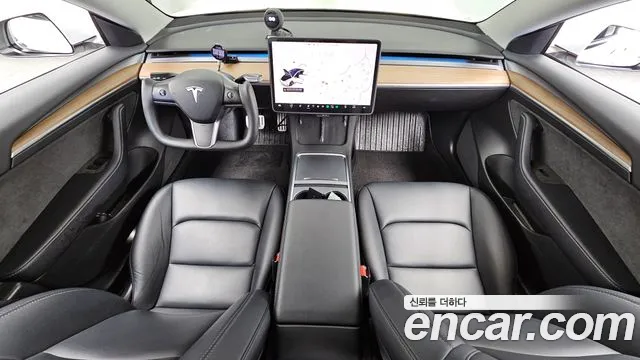 Tesla Model 3 — Фото автомобиля 7