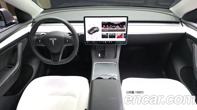 Tesla Model Y — Фото автомобиля 10