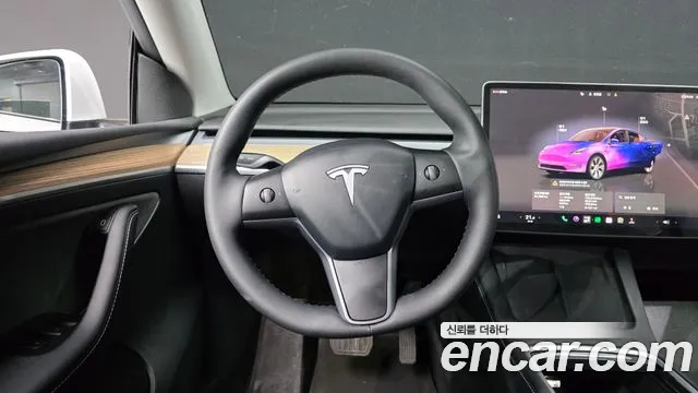 Tesla Model Y — Фото автомобиля 15