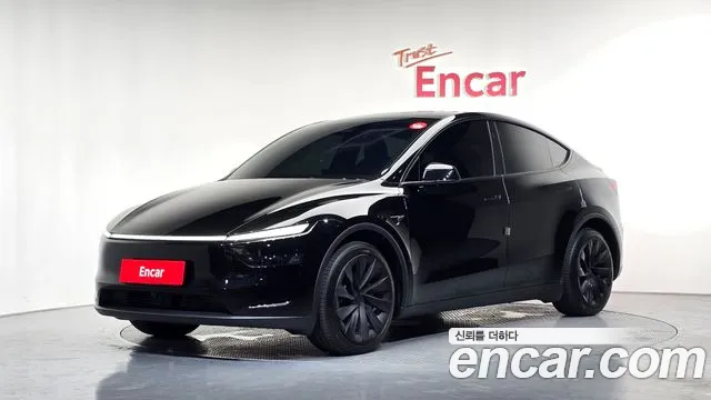 Tesla Model Y — Фото автомобиля 10