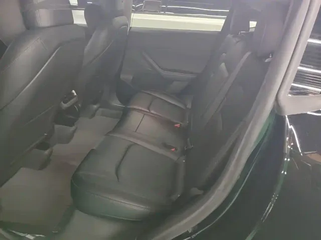 Tesla Model Y — Фото автомобиля 16