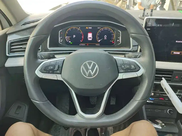 Volkswagen Tiguan L — Фото автомобиля 10