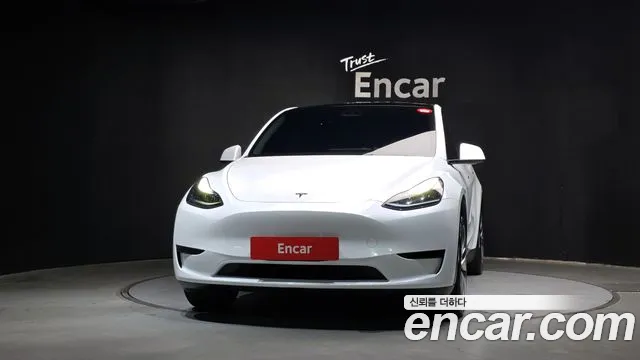 Tesla Model Y — Фото автомобиля 3