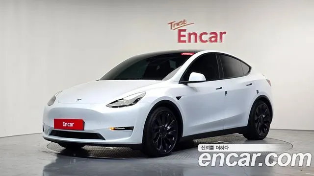 Tesla Model Y — Фото автомобиля 4