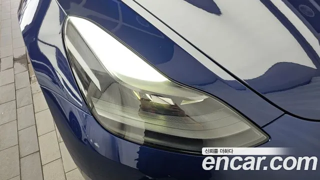 Tesla Model 3 — Фото автомобиля 18