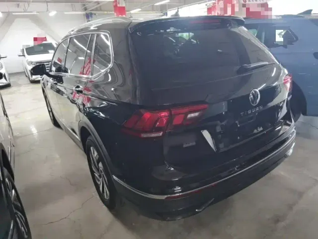 Volkswagen Tiguan L — Фото автомобиля 4