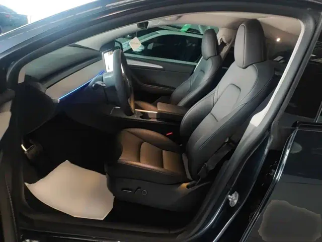 Tesla Model Y — Фото автомобиля 14