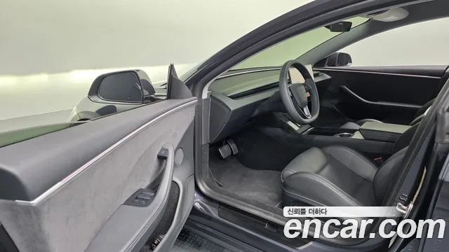 Tesla Model 3 — Фото автомобиля 14