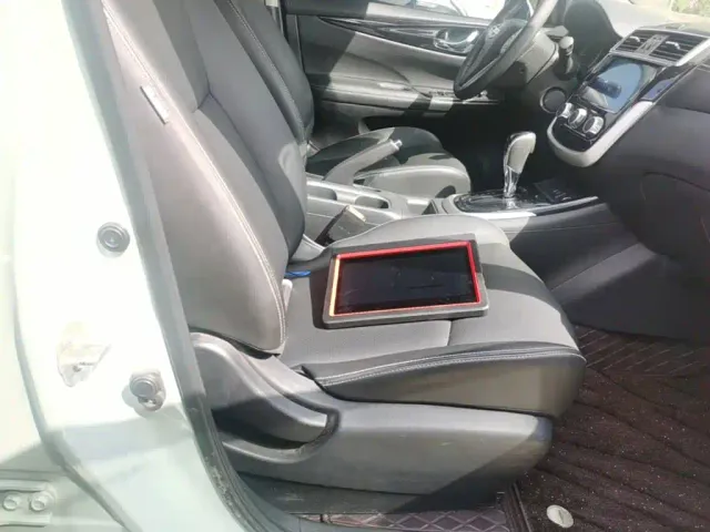 Nissan Tiida — Фото автомобиля 24