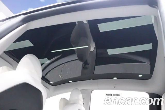 Tesla Model Y — Фото автомобиля 6