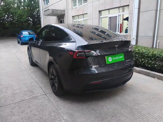 Tesla Model Y 2024 Rear-Wheel Drive Version — Фото автомобиля 4