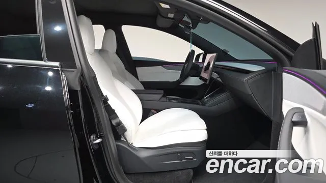 Tesla Model Y — Фото автомобиля 11