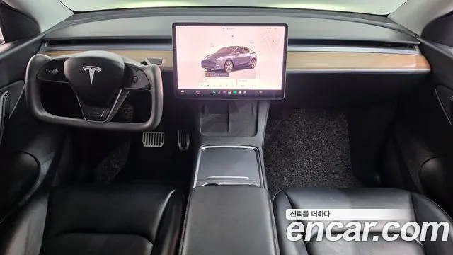 Tesla Model Y — Фото автомобиля 7