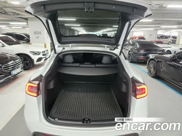 Tesla Model Y — Фото автомобиля 18