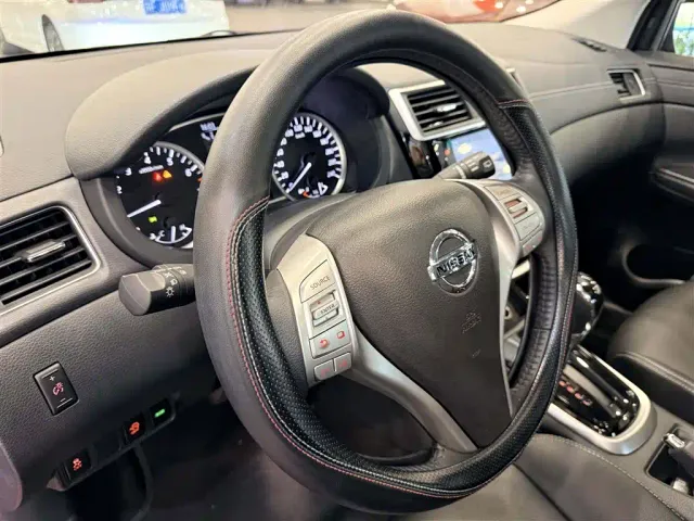 Nissan Tiida — Фото автомобиля 18