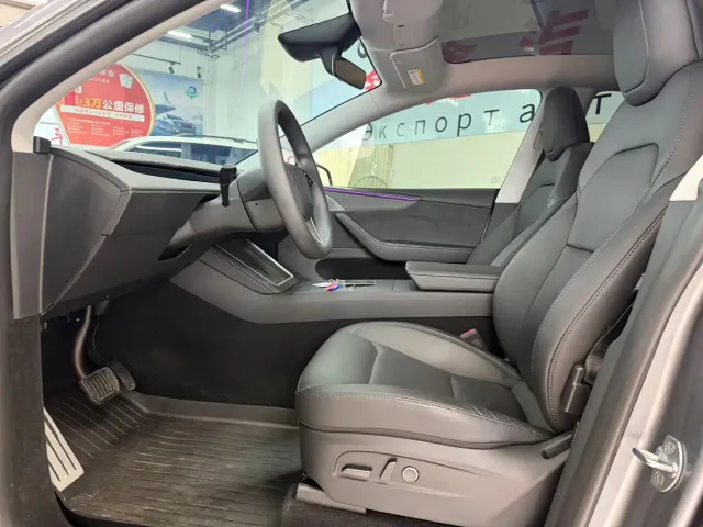Tesla Model Y — Фото автомобиля 13