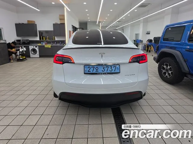 Tesla Model Y — Фото автомобиля 4
