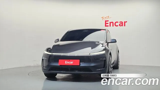 Tesla Model Y — Фото автомобиля 3