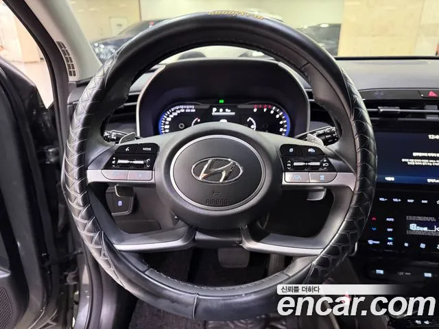 Hyundai Tucson Tucson (NX4) Бензин 1.6 Turbo 4WD — Фото автомобиля 9