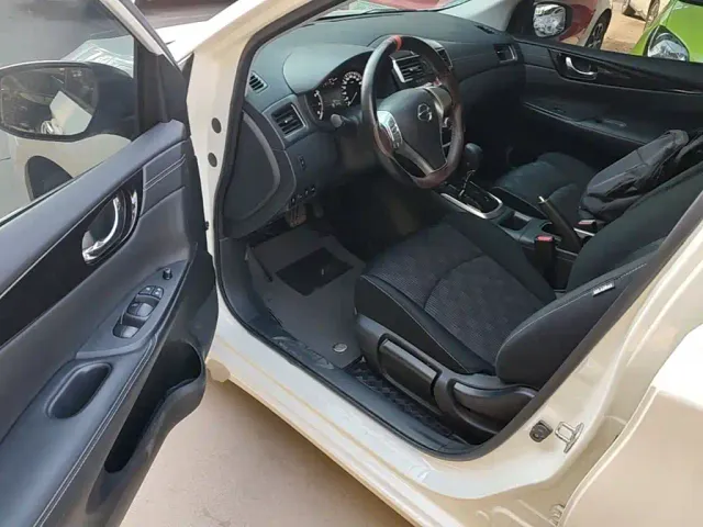 Nissan Tiida — Фото автомобиля 15
