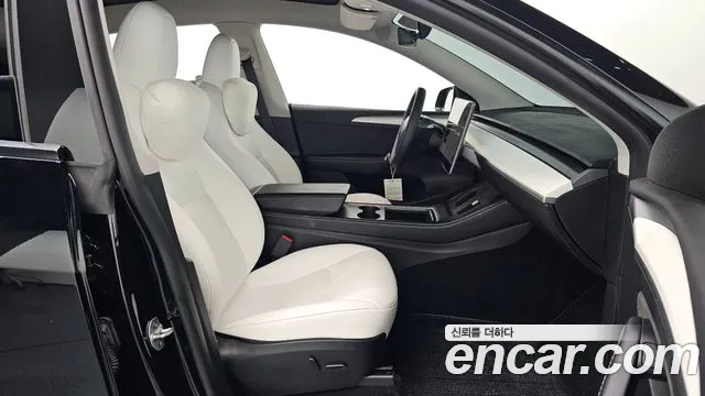 Tesla Model Y — Фото автомобиля 23