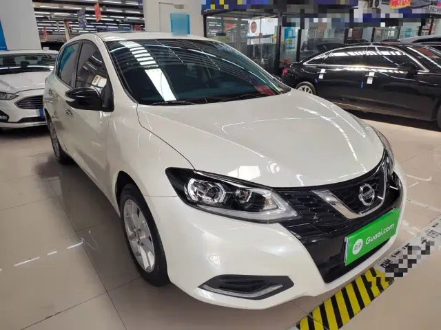 Nissan Tiida — Фото автомобиля 21