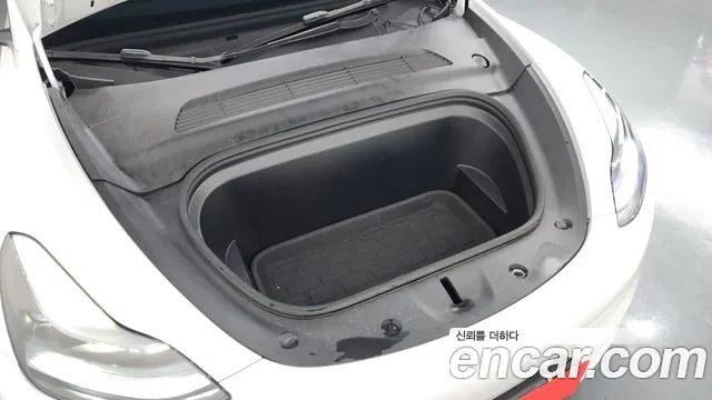Tesla Model Y — Фото автомобиля 6