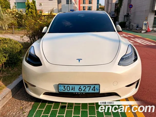 Tesla Model Y — Фото автомобиля 3