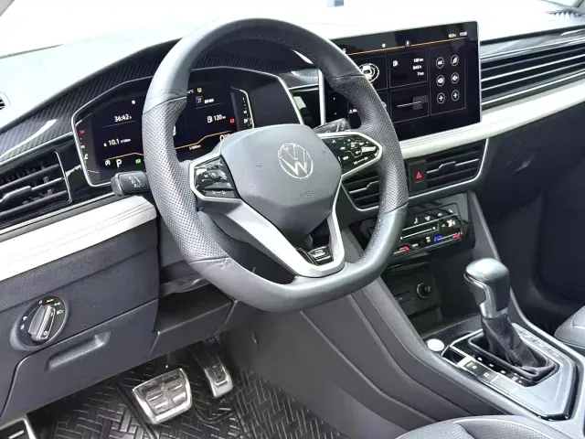 Volkswagen Tiguan L — Фото автомобиля 6