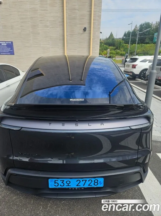 Tesla Model Y — Фото автомобиля 2