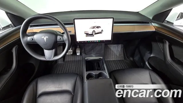 Tesla Model Y — Фото автомобиля 10