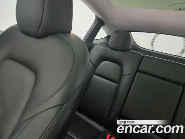 Tesla Model Y — Фото автомобиля 12