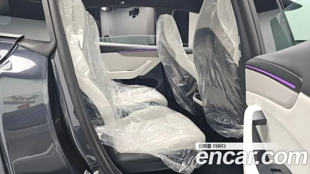 Tesla Model Y — Фото автомобиля 11