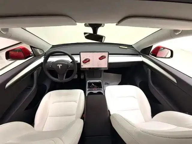 Tesla Model Y — Фото автомобиля 5