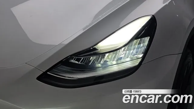 Tesla Model Y — Фото автомобиля 7