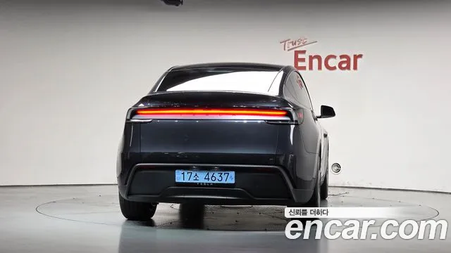 Tesla Model Y — Фото автомобиля 4
