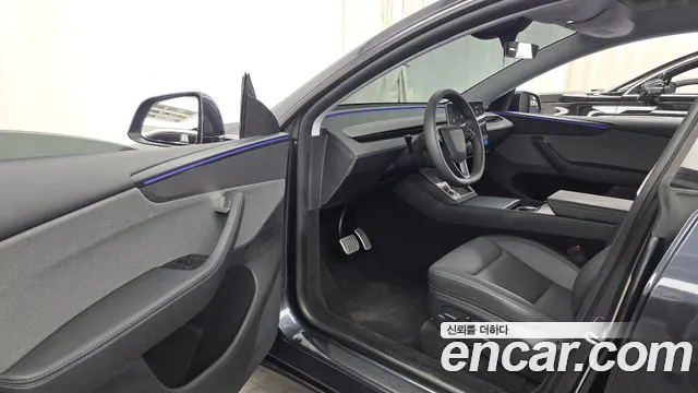 Tesla Model Y — Фото автомобиля 10