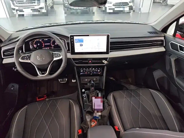 Volkswagen Tiguan L — Фото автомобиля 9