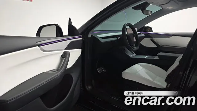 Tesla Model Y — Фото автомобиля 14